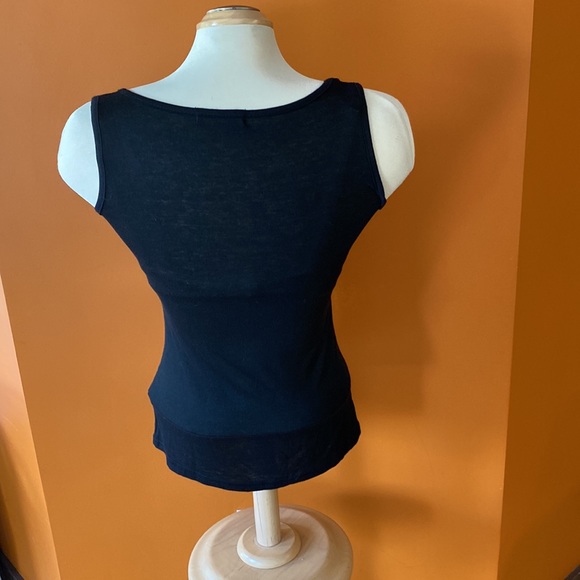 3/$20. Three tank tops sizes extra small, small and medium. - Picture 3 of 13